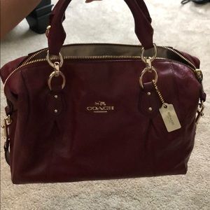 Burgundy pleather coach arm bag